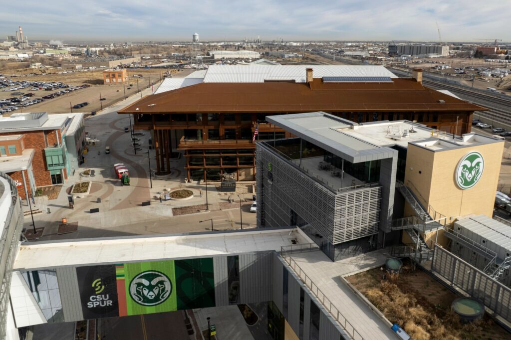 Aerial view of the CSU Spur Terra building with the Livestock Event Center in the background.